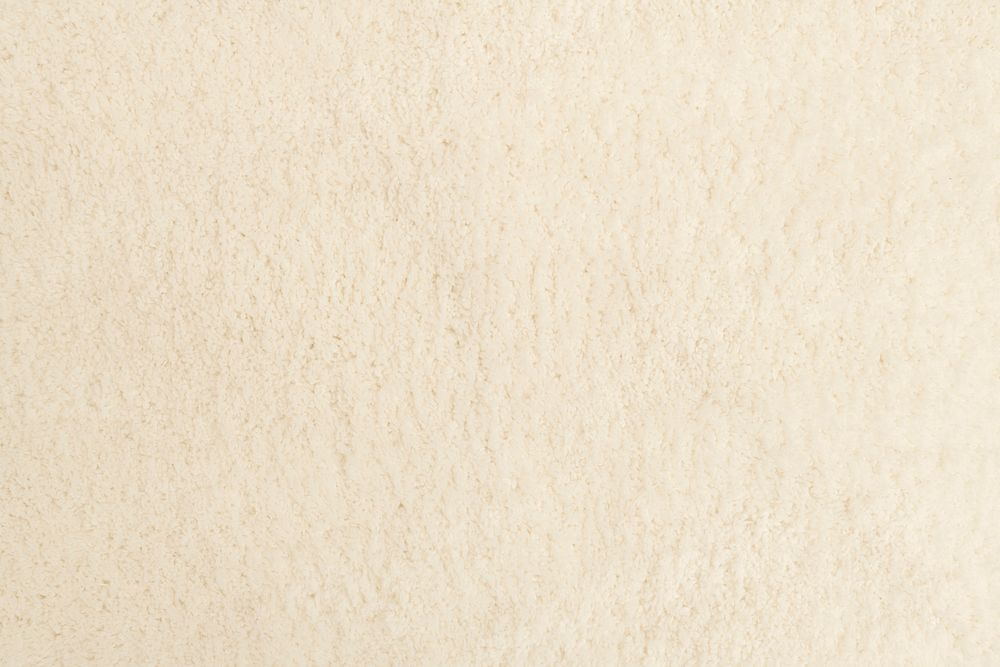 Beige textured fabric background with design space