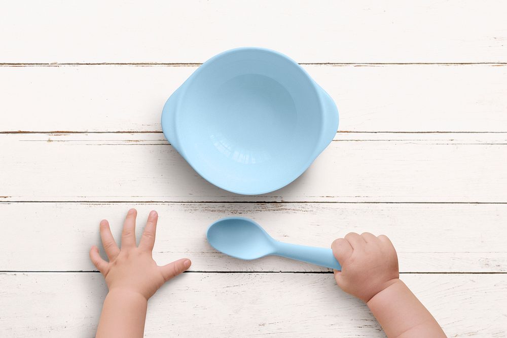 Baby hands psd kids tableware in blue