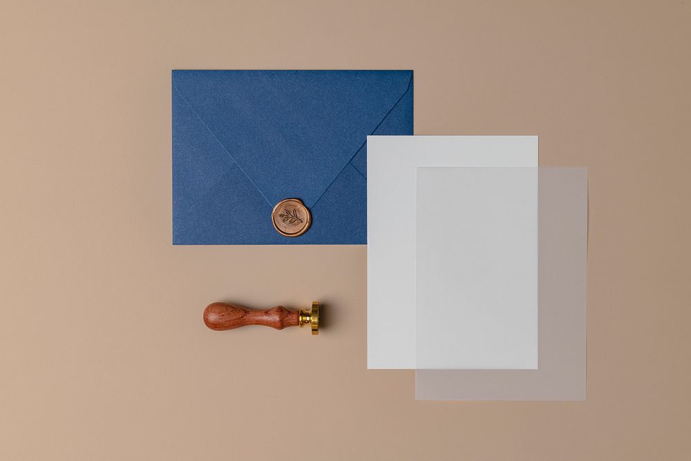 Wedding invitation card, blue envelope with wax seal, flat lay design