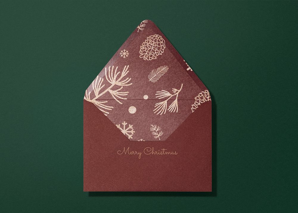 Christmas greeting card mockup, aesthetic stationery, red envelope, flat lay design, psd