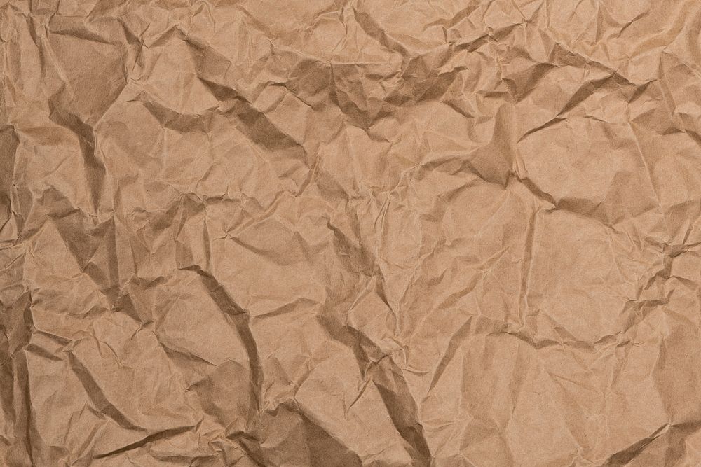 Crumpled brown paper textured background, free image by rawpixel.com /  Jira