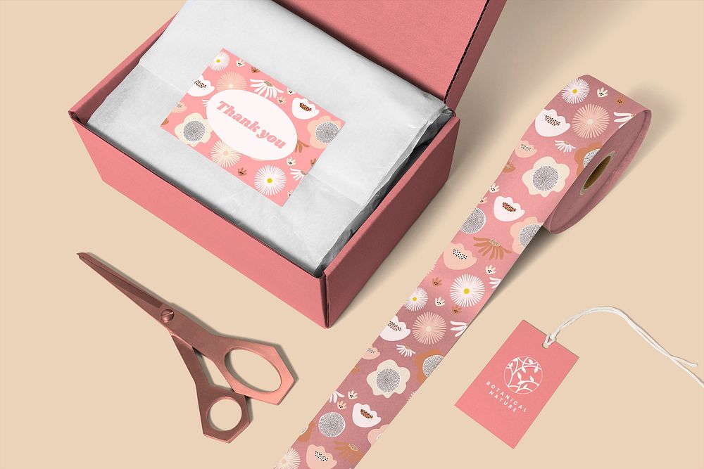 Branding mockup png, transparent wrap paper in pink mailing box, online business concept