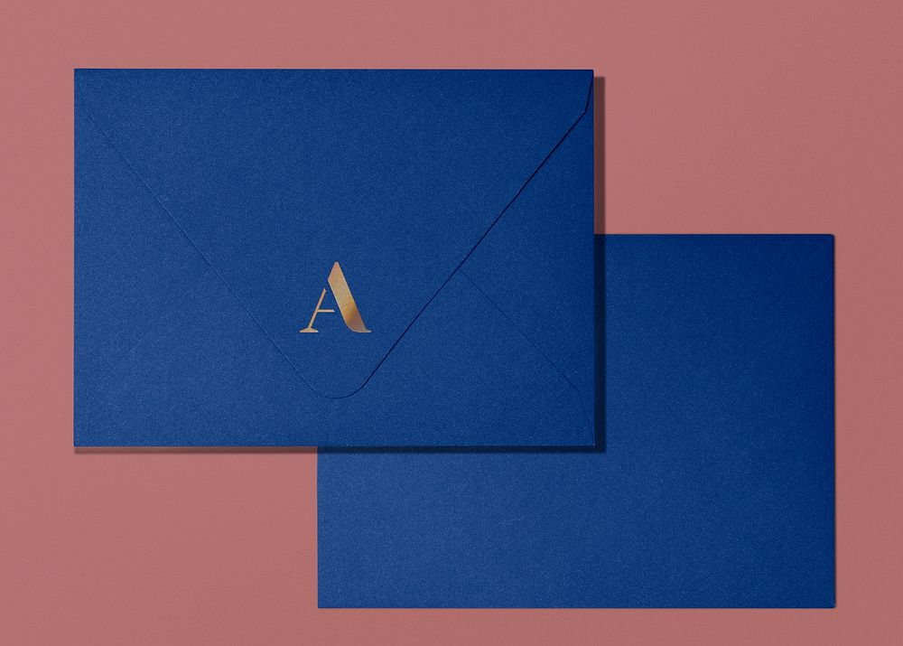 Blue envelope, gold A letter, flat lay design
