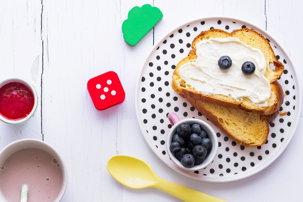 Kids cream cheese toast with blueberries