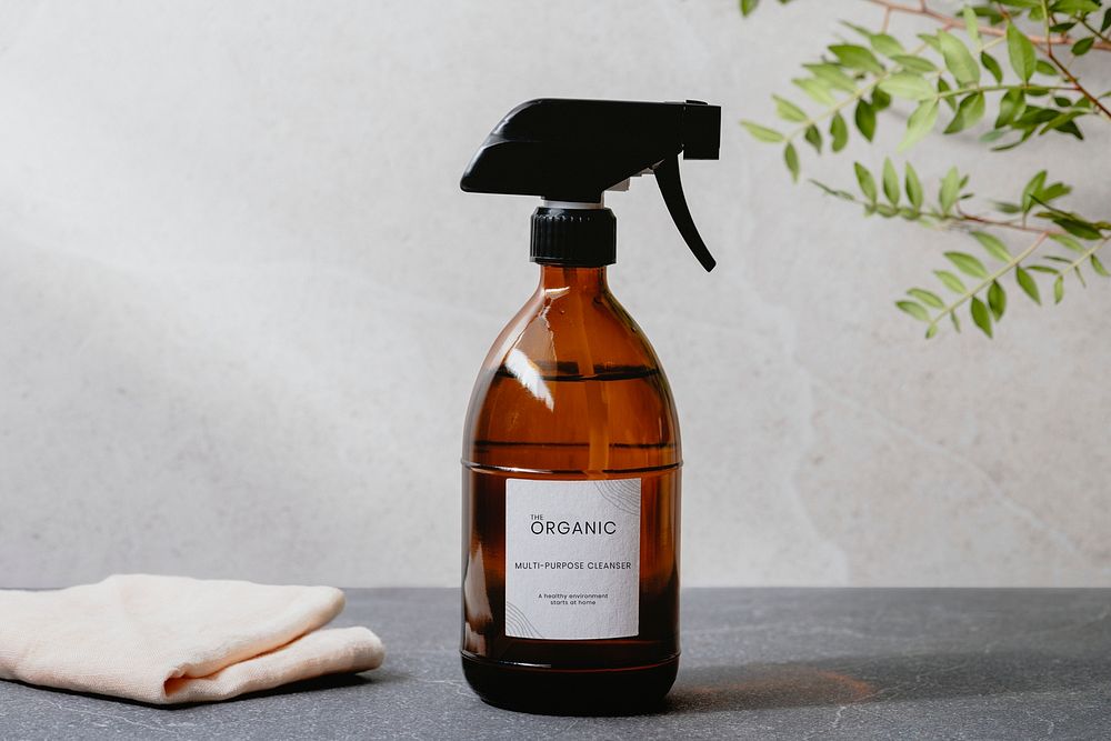 Label mockup psd brown spray bottle for home cleaning solution