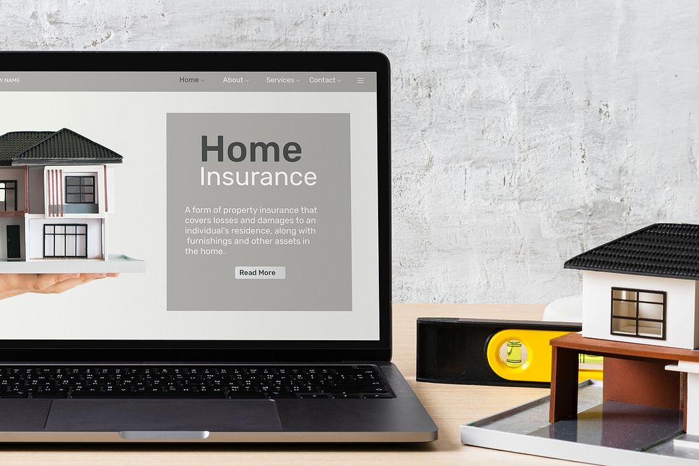 Laptop showing house insurance website