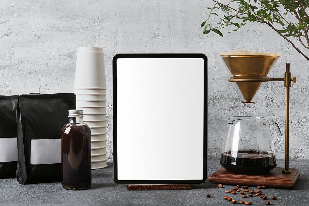 Tablet blank screen, coffee lover workspace