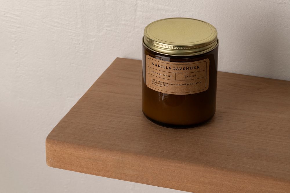Candle mockup on shelf, aromatic product packaging with psd label