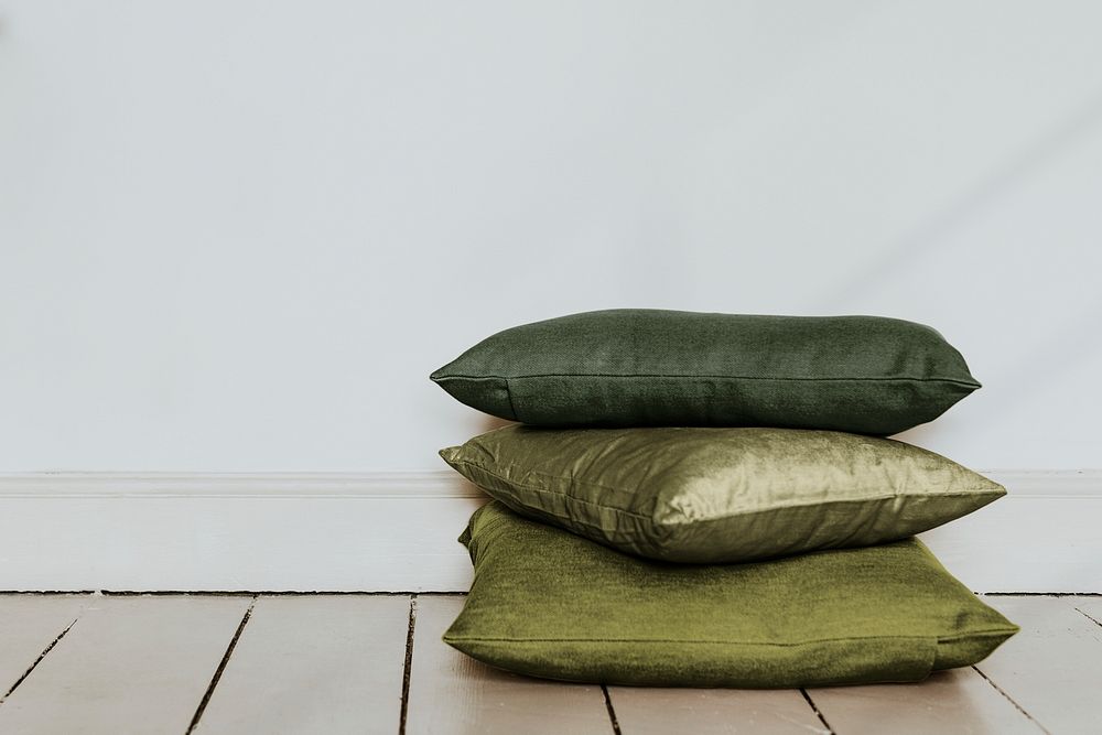 Aesthetic background, green cushions, natural home decor