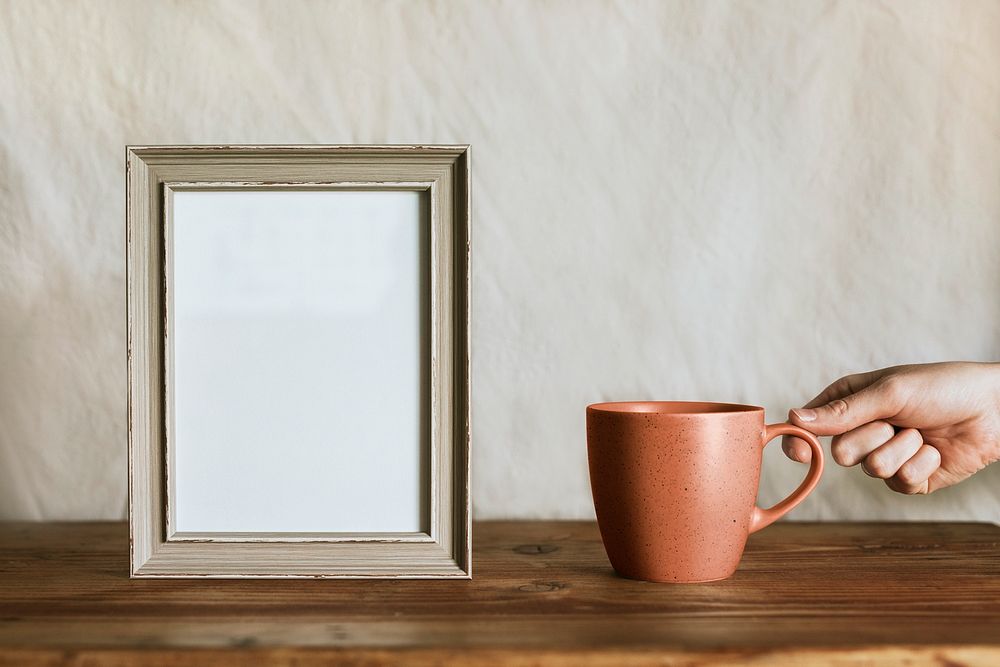 Empty frame & coffee cup, aesthetic home decor