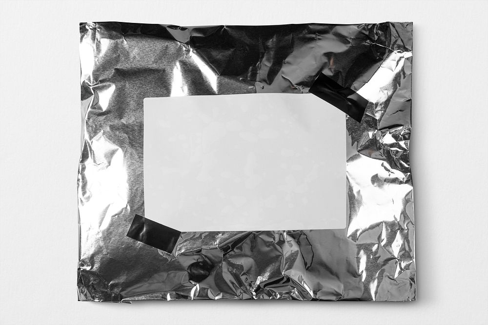 Silver mailer bag with blank white shipping label