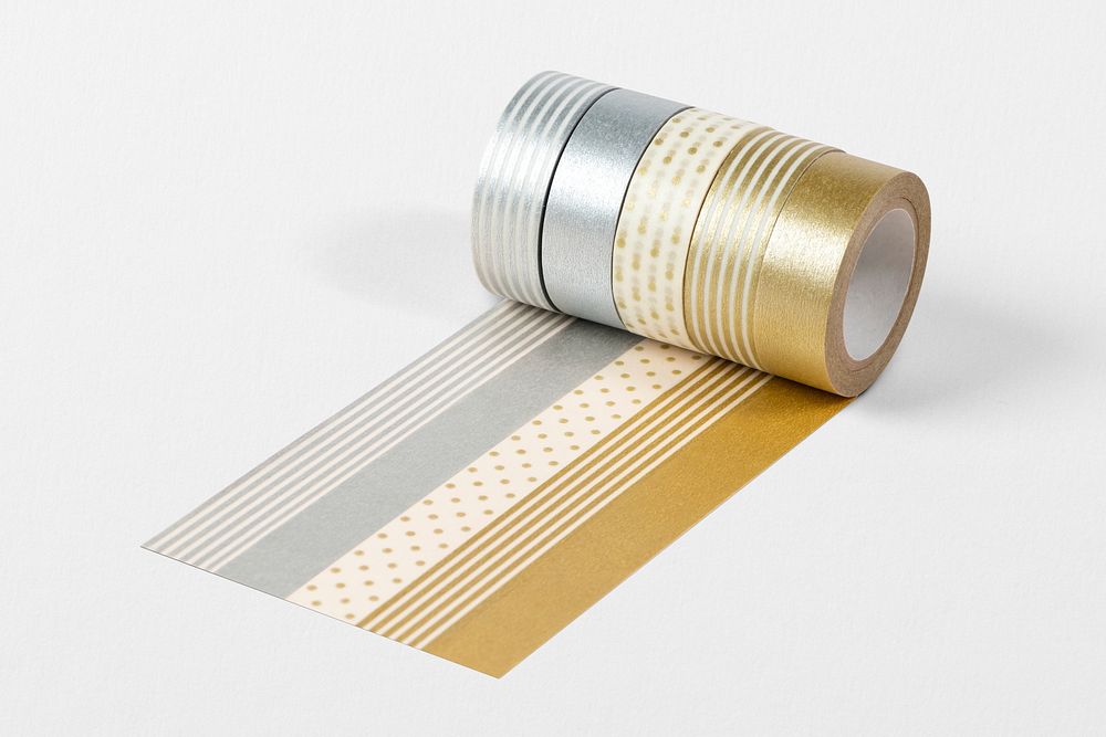 Gold and silver tape rolls, stationery element