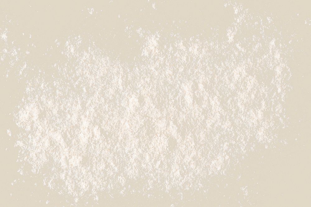 Flour texture on beige background