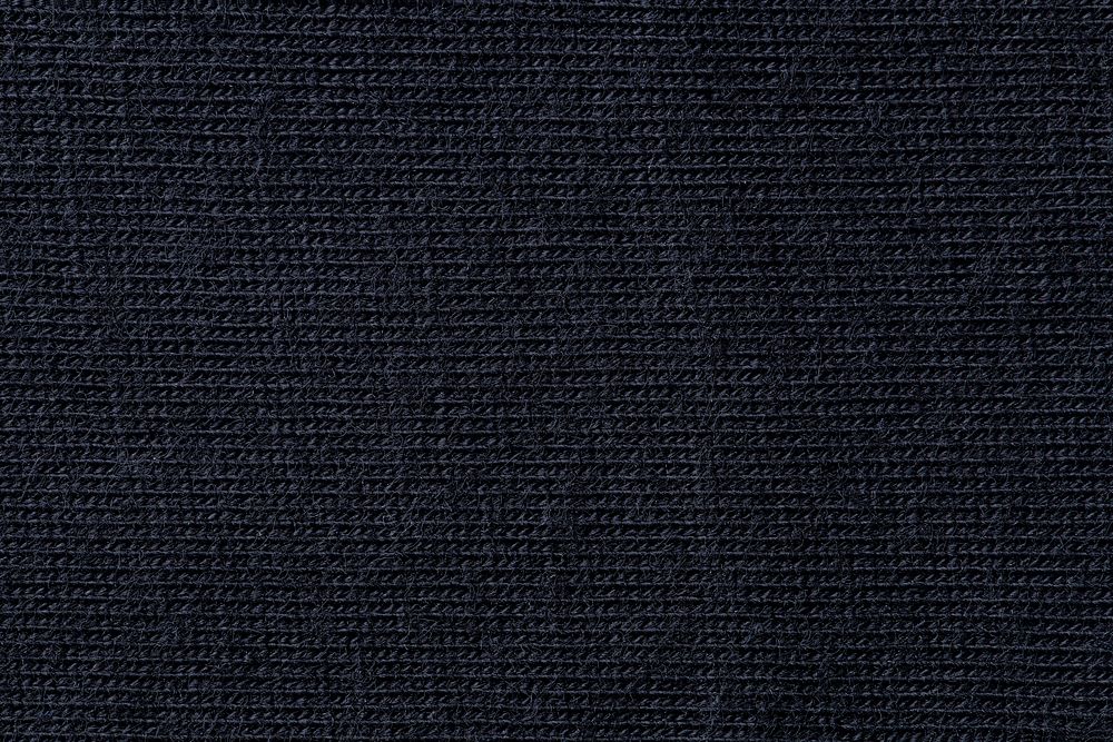 Black background, knitted fabric texture, macro shot design