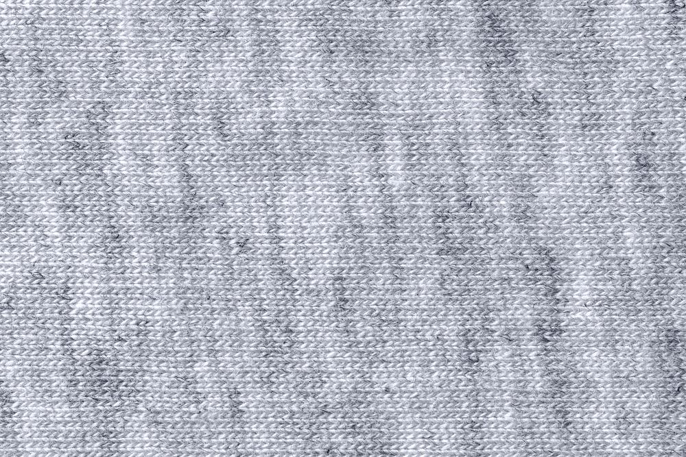 Gray fabric background, knitted texture, macro shot design