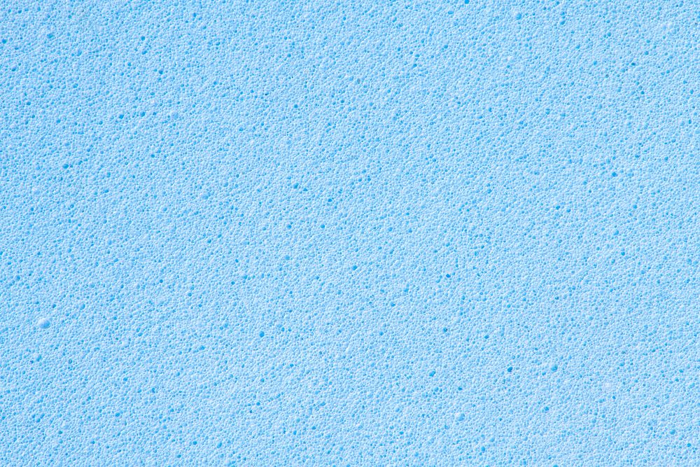 Blue background, rough sponge texture, macro shot design