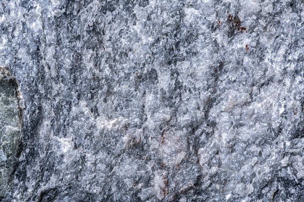 Rough stone texture, gray background, design space