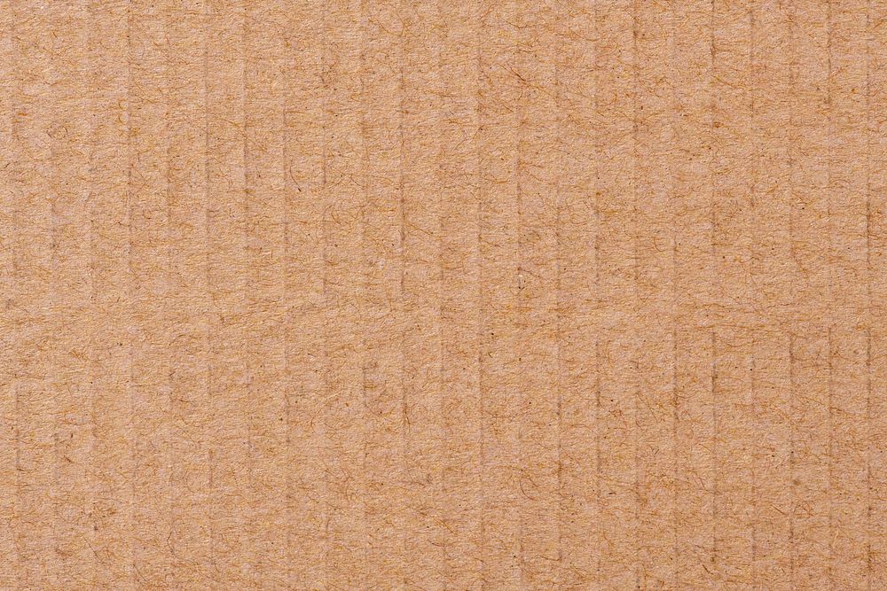 Corrugated paper texture, brown background