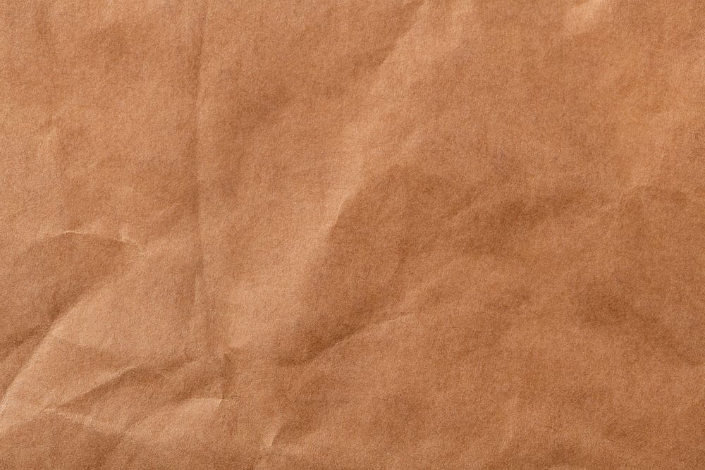 Wrinkled brown paper texture background
