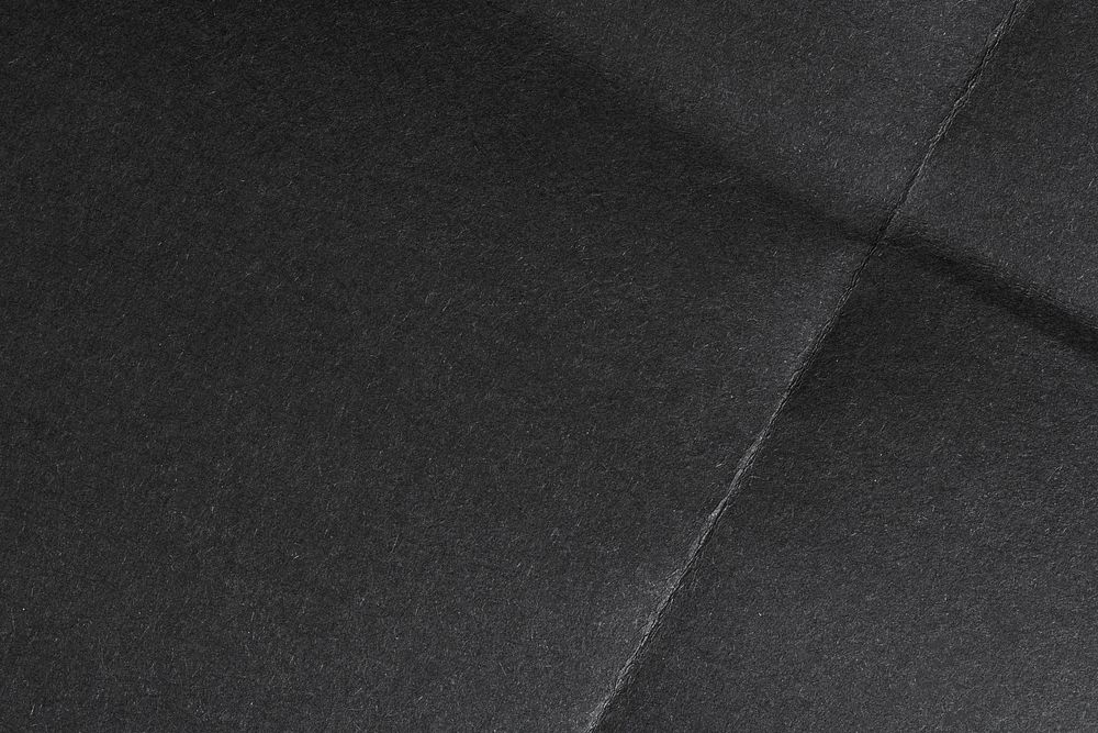 Black background, folded paper texture design