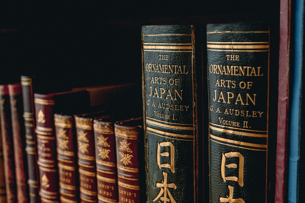 Antique books in library, vintage background