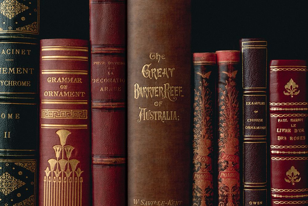 Antique books in library, vintage background