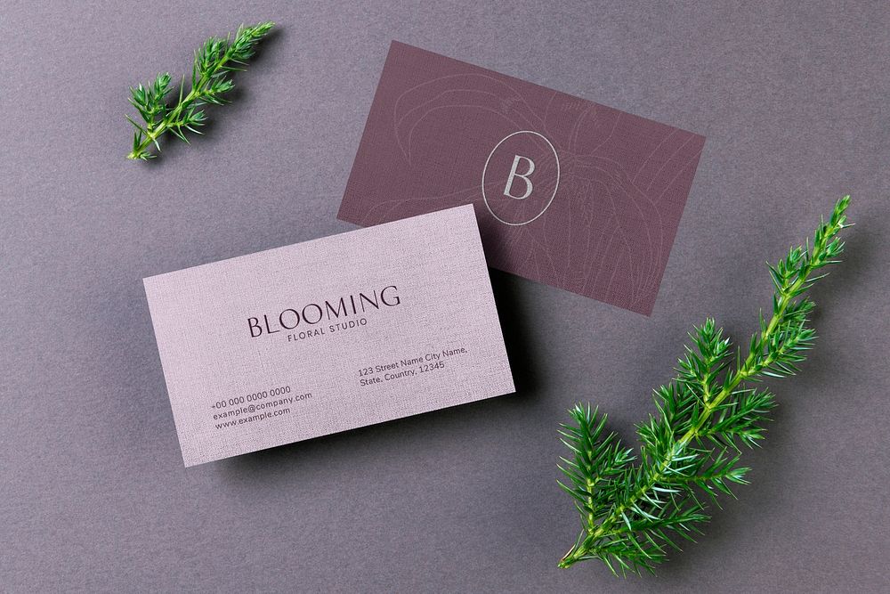 Business card mockup, front and back design, flat lay with leaf psd