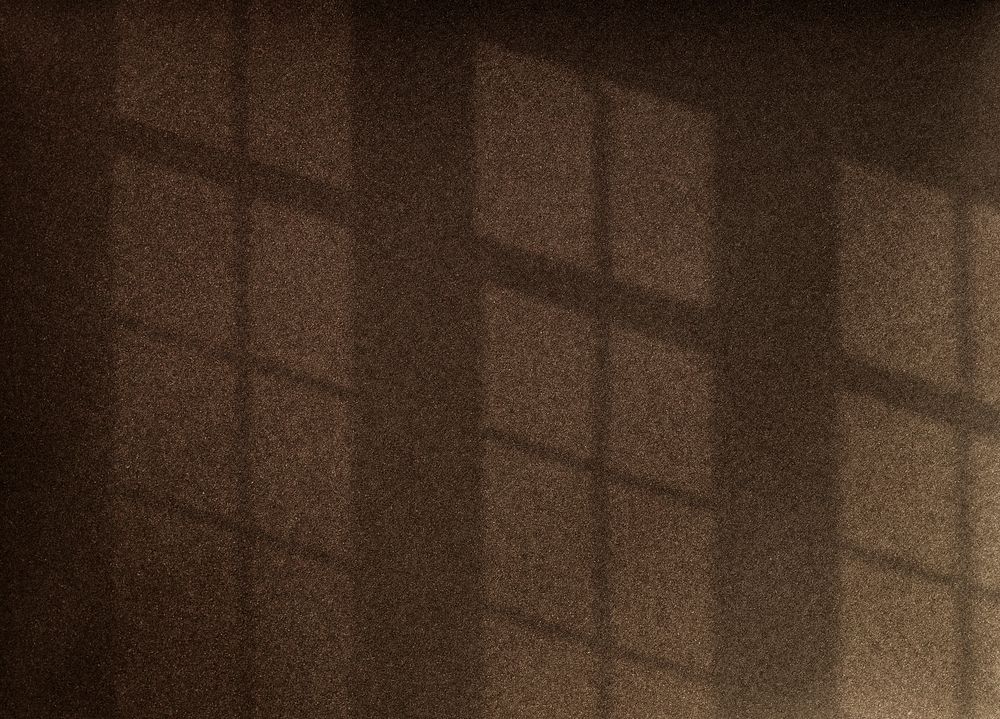 Shadow of window on a brown wall