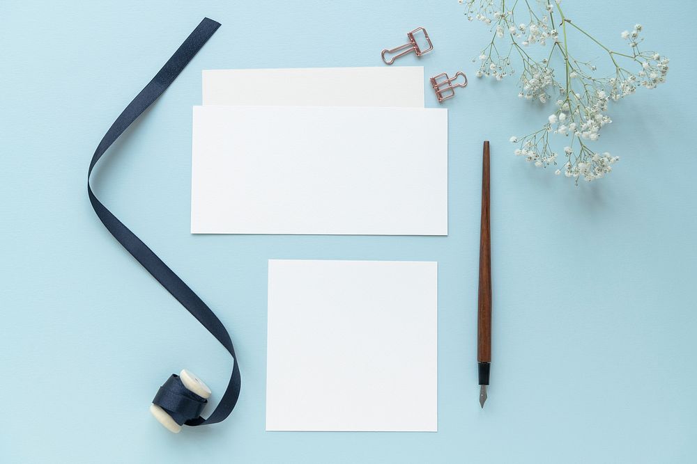 Blank paper notes on a blue background