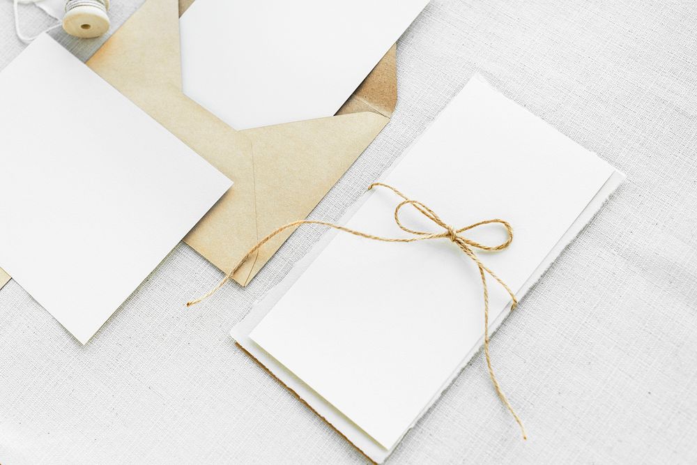 White paper notes on fabric textured background
