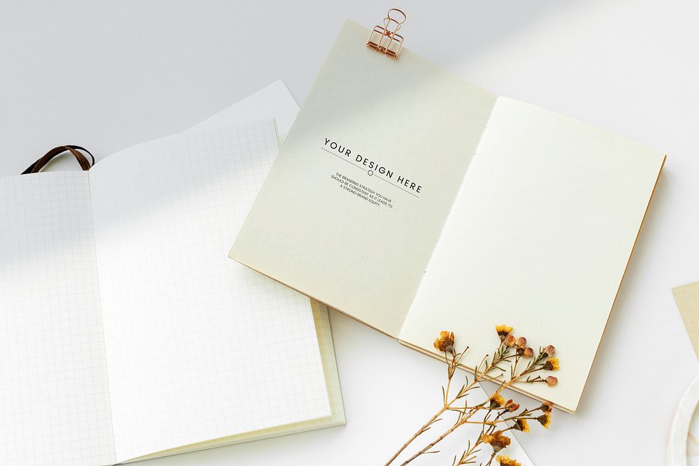 White notebook template mockup with dried plant