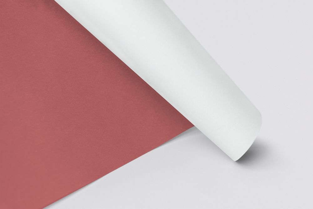 Dark red and white curled chart paper mockup on a gray background