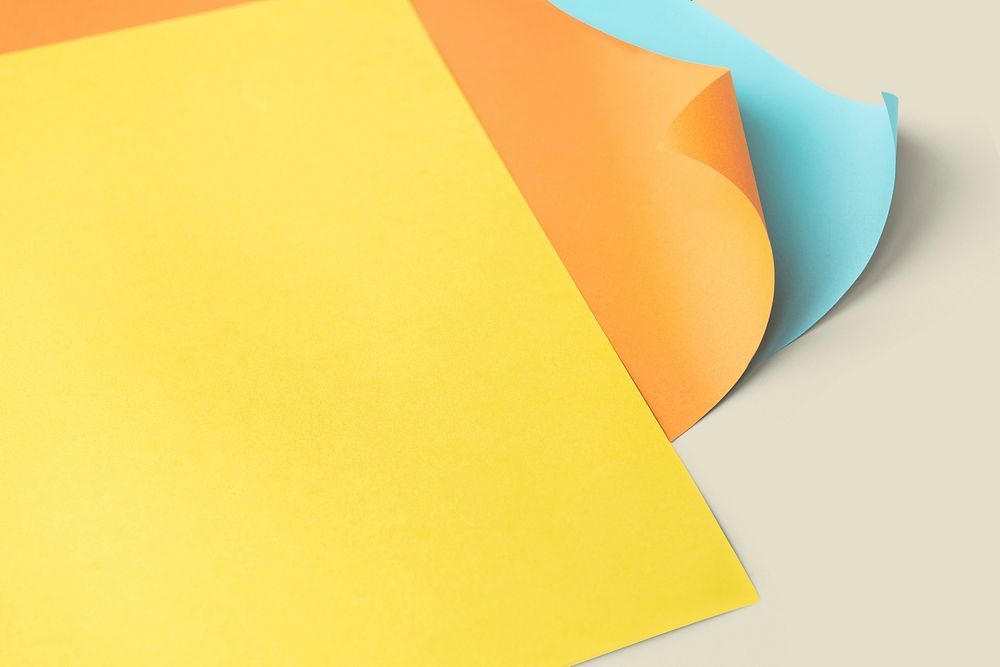 Colorful curled paper mockup on a gray background