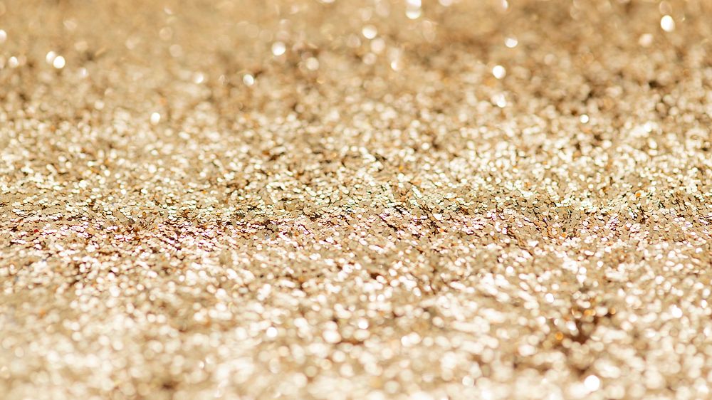 Sparkly gold glitter background texture