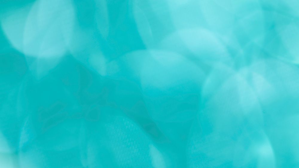 Shiny blurry turquoise glitter textured background