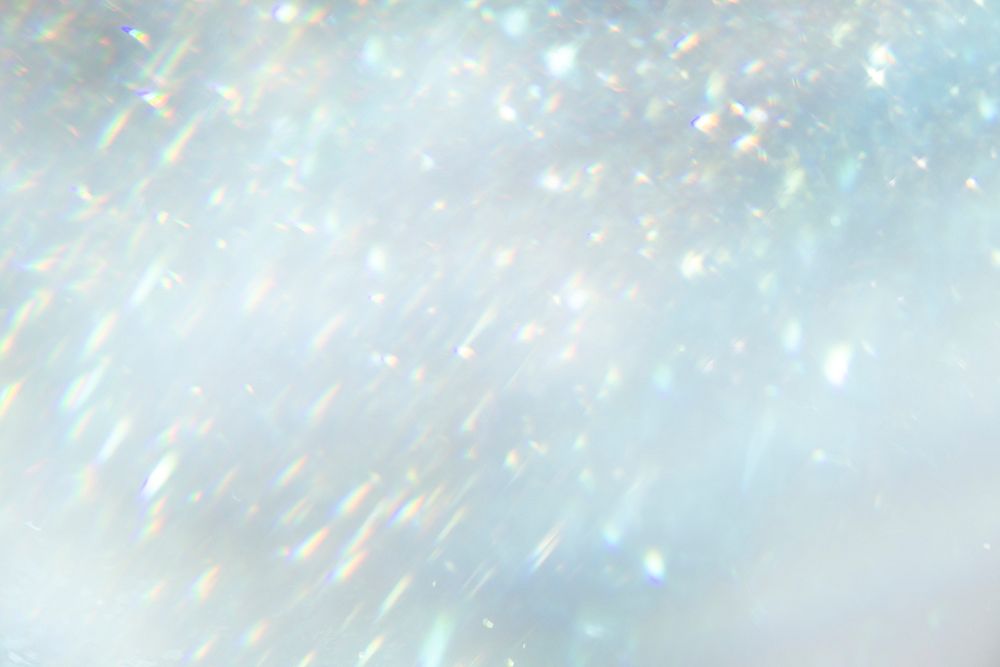 Blurry silver glitter background texture