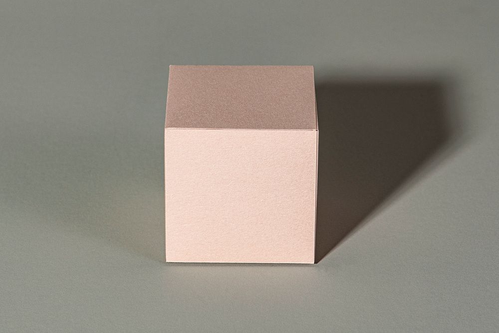 3D pink cubic paper craft on a gray background