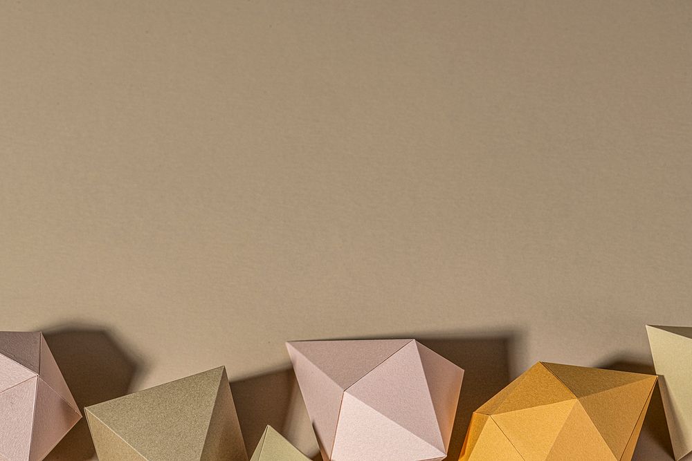 3D geometric shapes on a beige background