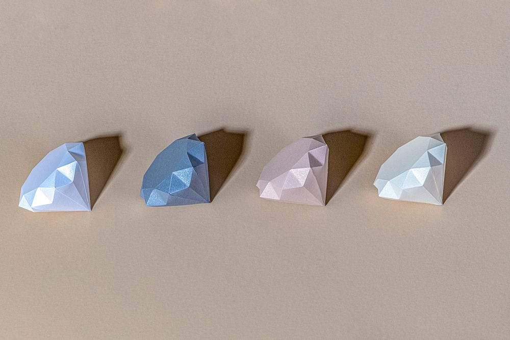 3D geometric diamond shape set on a beige background