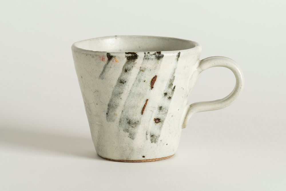 Rustic tea cup with brush strokes design resource 