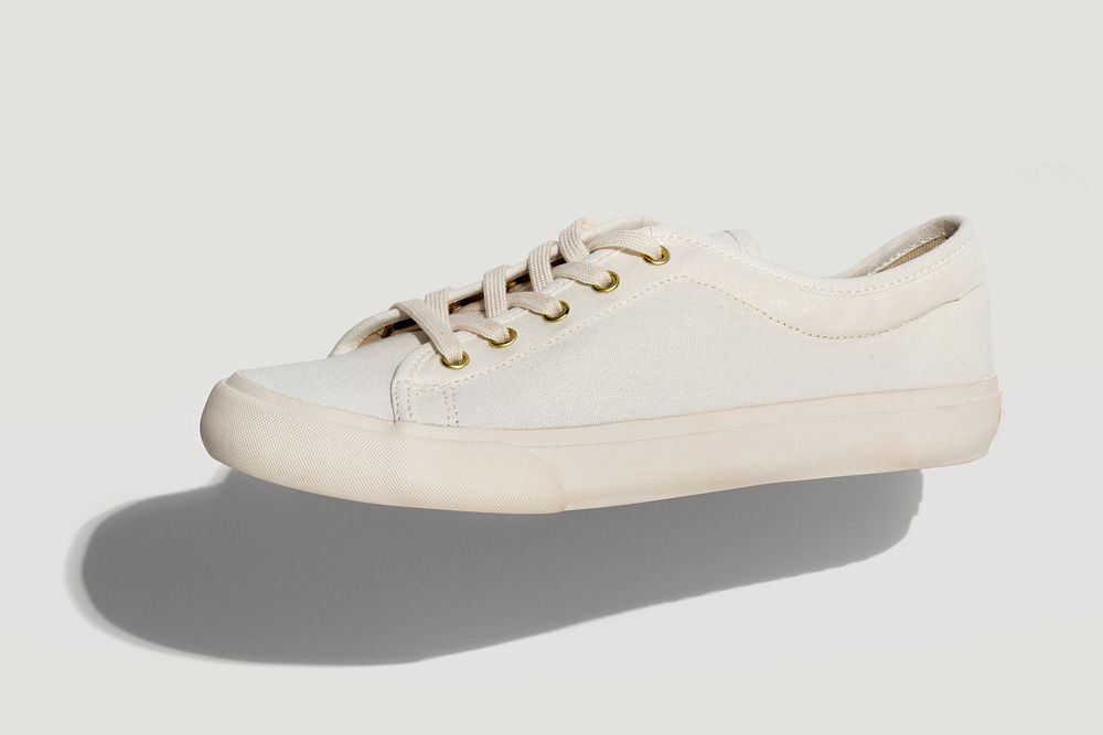 Unisex white sneakers on a white background 