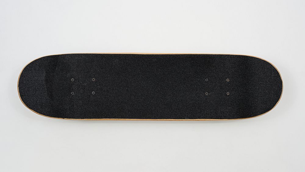 Black skateboard on white background