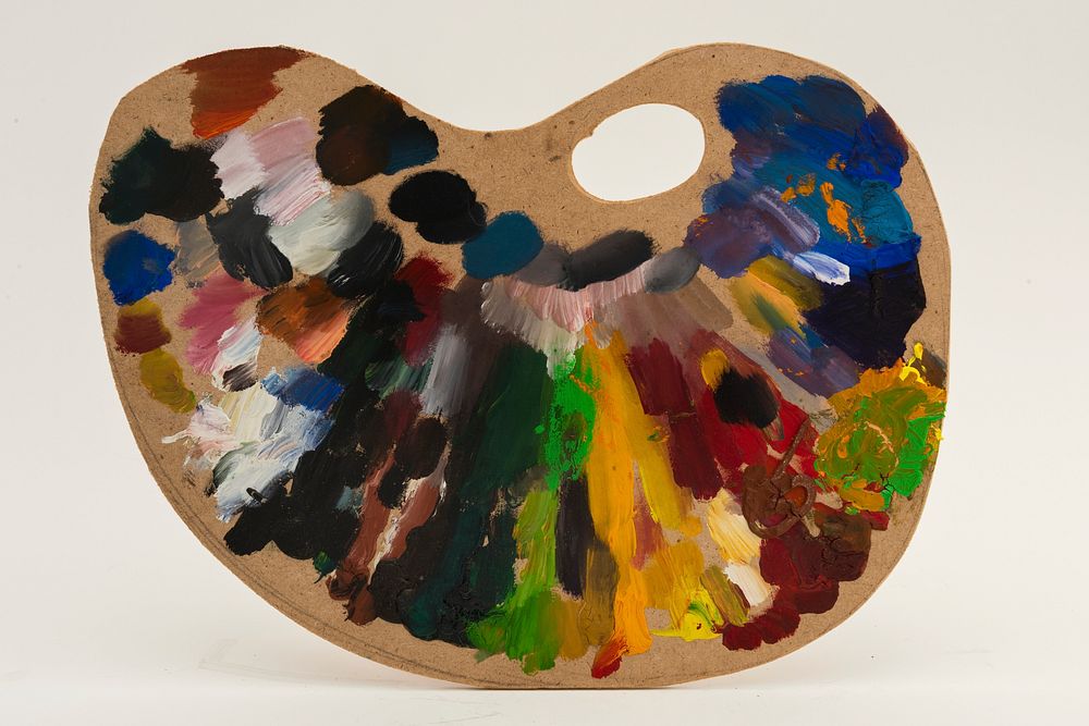 Colorful artist's palette on a gray background 