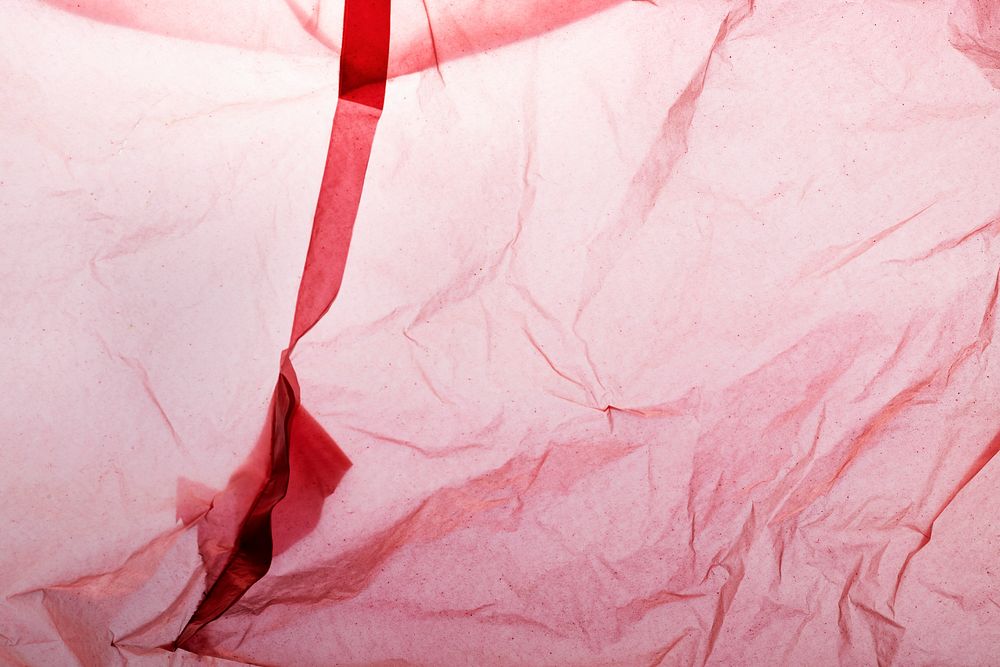 Red single-use plastic bag 