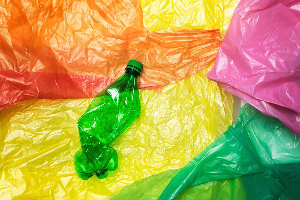 Disposable plastic bottle on plastic bags 