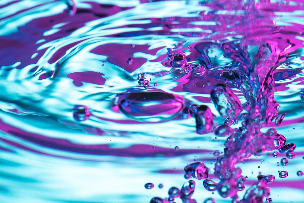 Vibrant neon liquid textured background