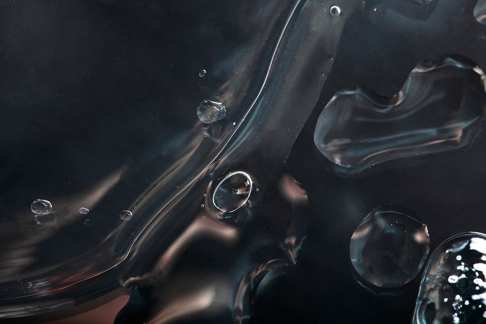 Black water background with bubbles 