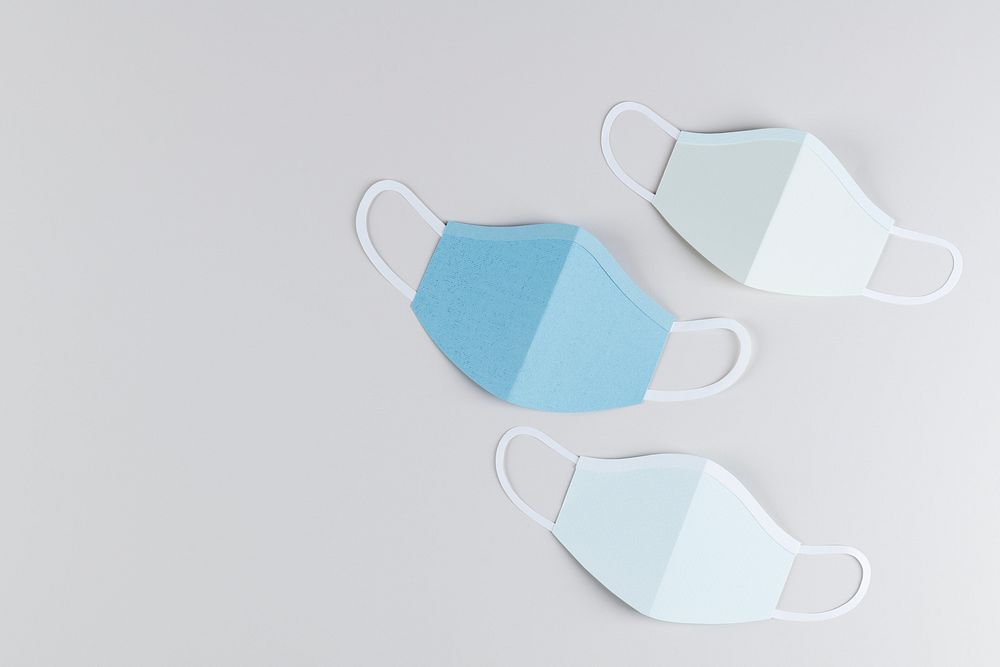 Paper craft surgical face masks on a gray background illustration