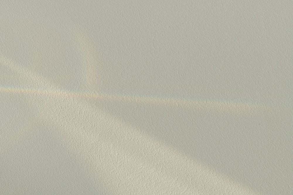 Prism light on a blank beige background