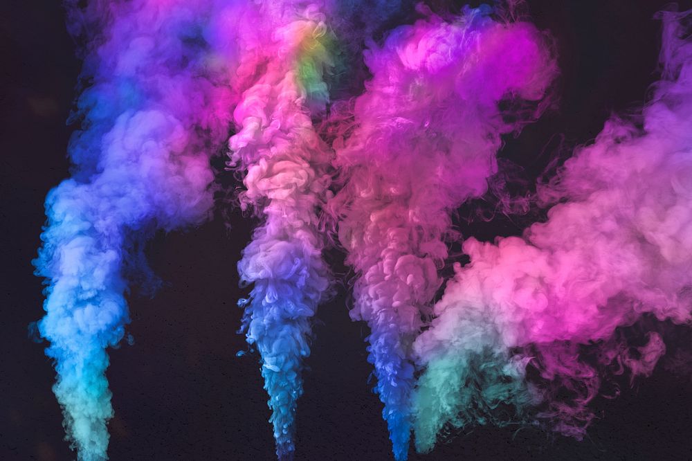 Pink and blue smoke effect on a black background wallpaper